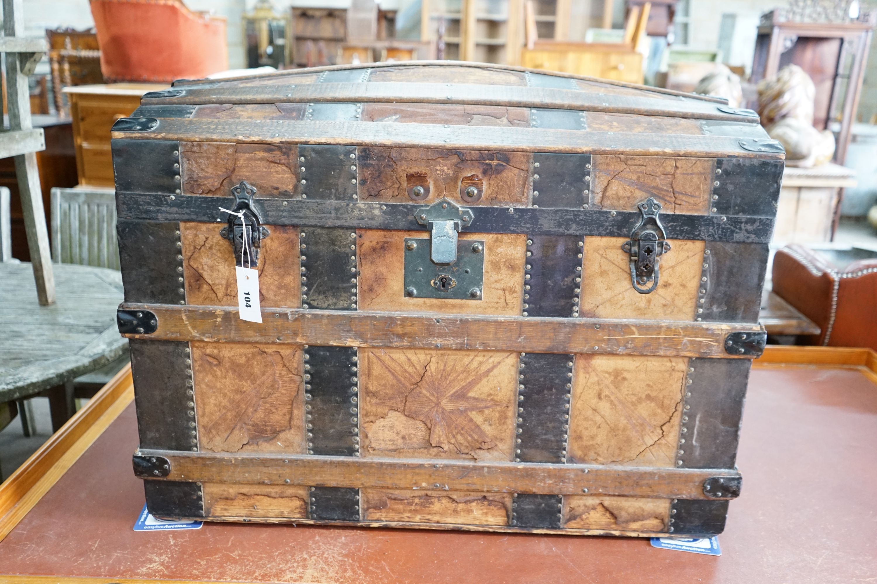 A late Victorian iron bound domed top trunk, length 82cm, depth 48cm, height 60cm